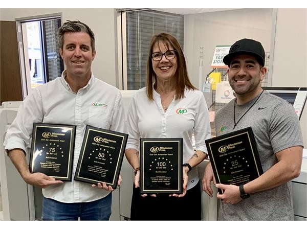 {Minuteman Press Franchise, Miramar/San Diego. Pictured L-R: Rob Overstreet (Owner), Cathleen Stamm (Account Manager), and Abel Zaragoza (Graphics/Production).}