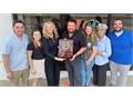 Second-Generation Minuteman Press Franchise Celebrates Growth in Clinton, NC; Schulte Family Joins President’s Club