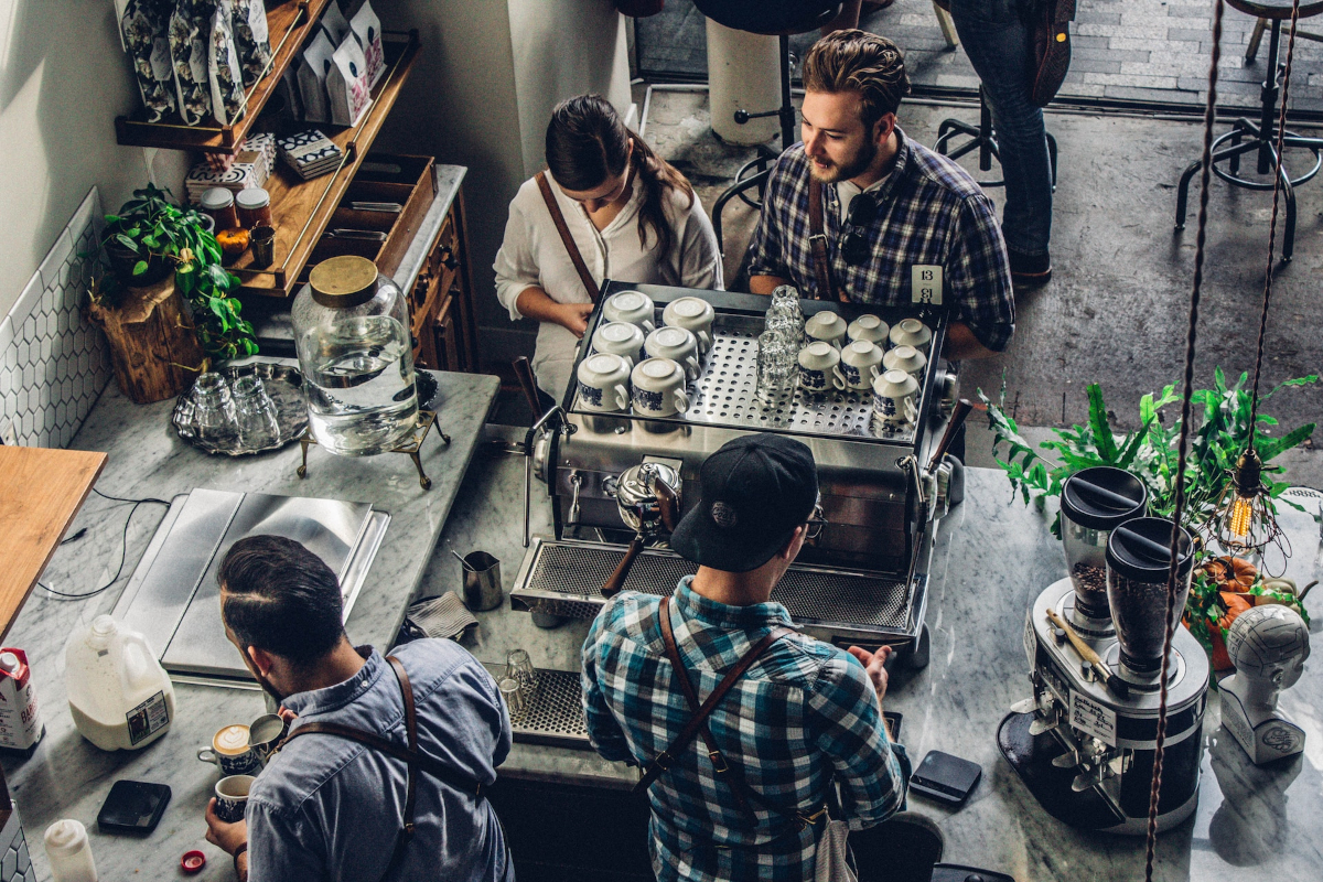 Baristas helping customers 