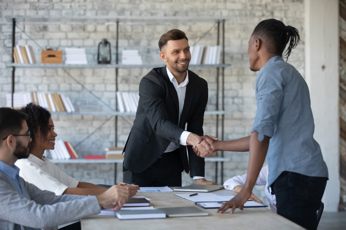 Two business men shaking hands