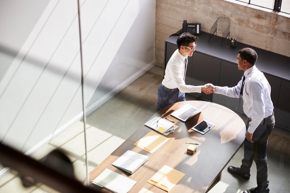 Two businessmen shaking hands