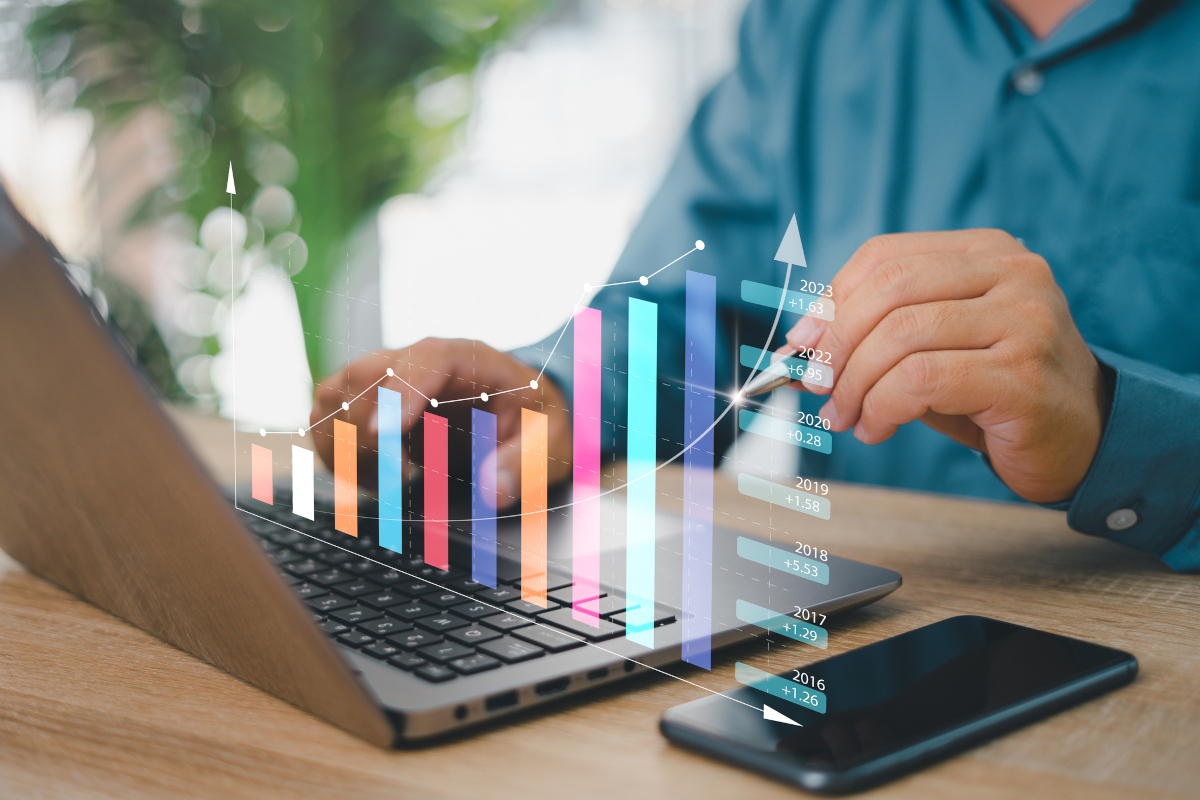 Business person checking graphs and stats