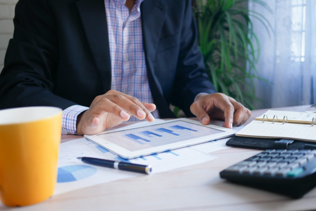 Business person checking stats