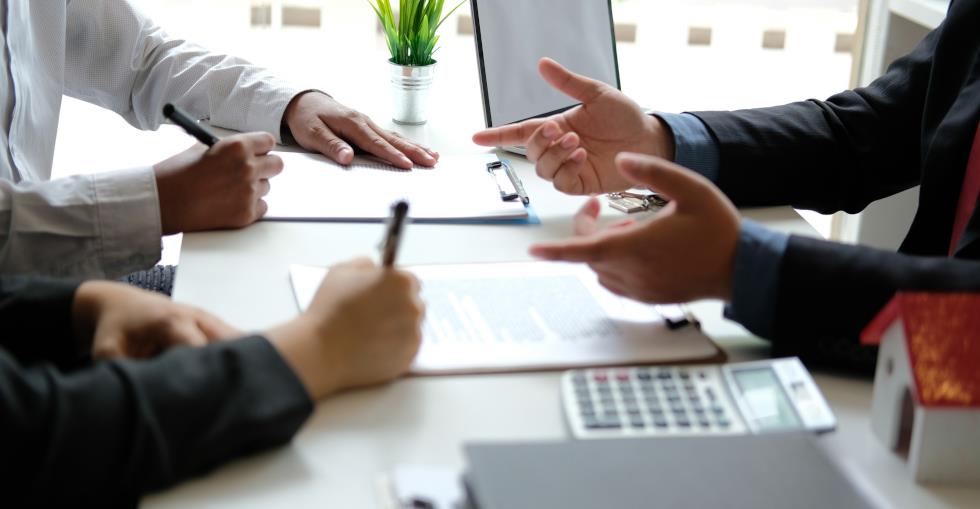 Business people discussing documents