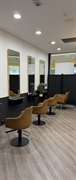 high-turnover hair salon with - 3