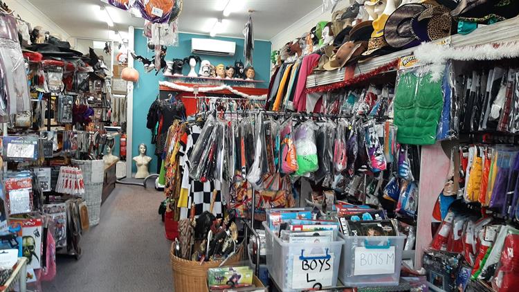 Fancy dress shop sale for rent near me