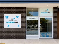 two self-service laundromats north-west - 2