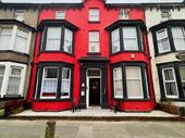 well-located 10-bedroom hotel with