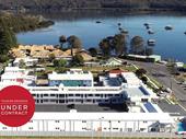 prestigious waterfront motel development