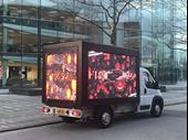 three digital advertising vans