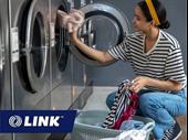 near-new laundromat skip the
