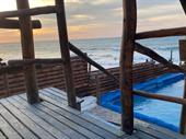 beachfront 12-apartment backpackers' hostel