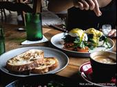 busy corner cafe for